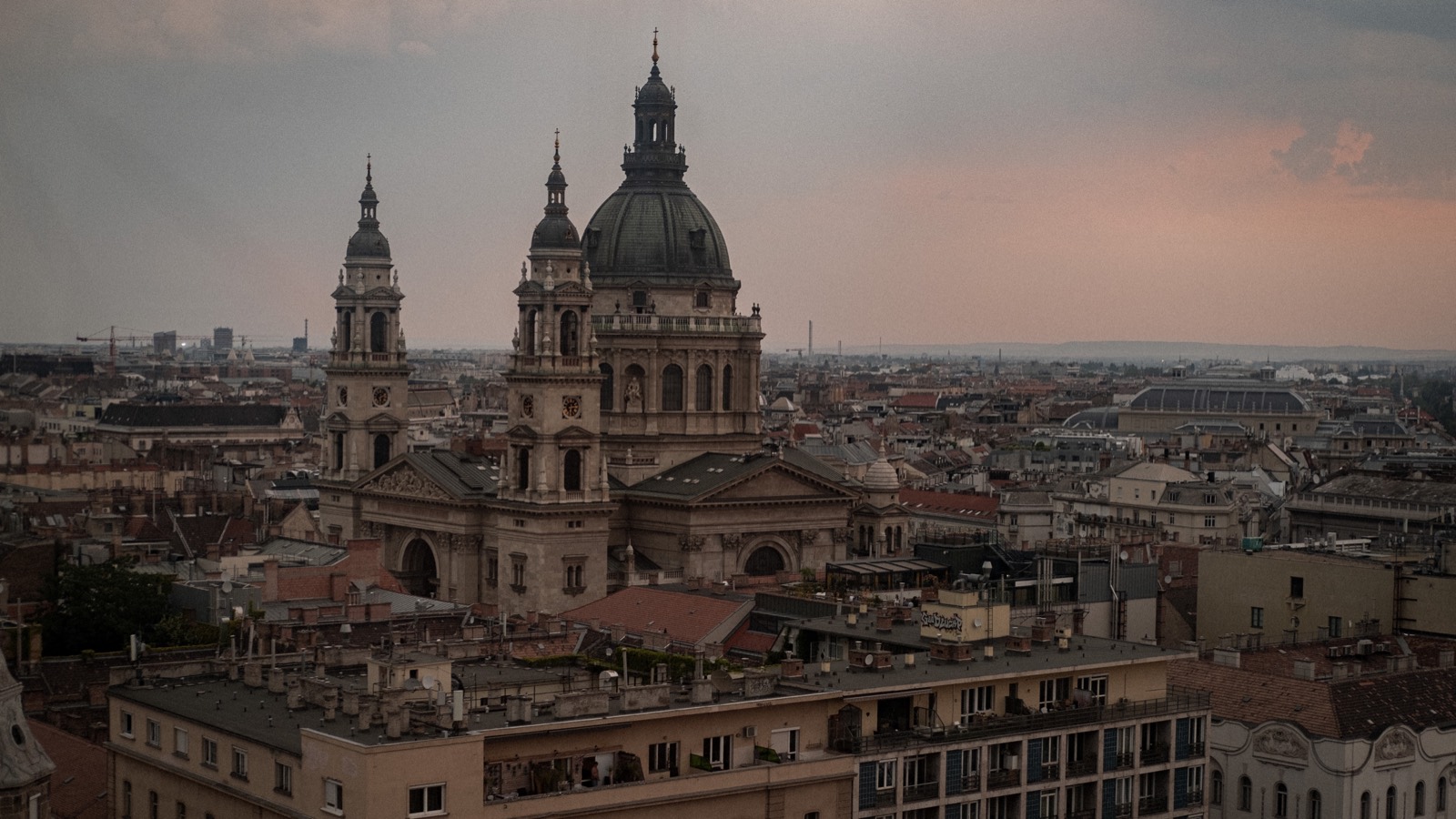 Basilica above the rooftops at dusk