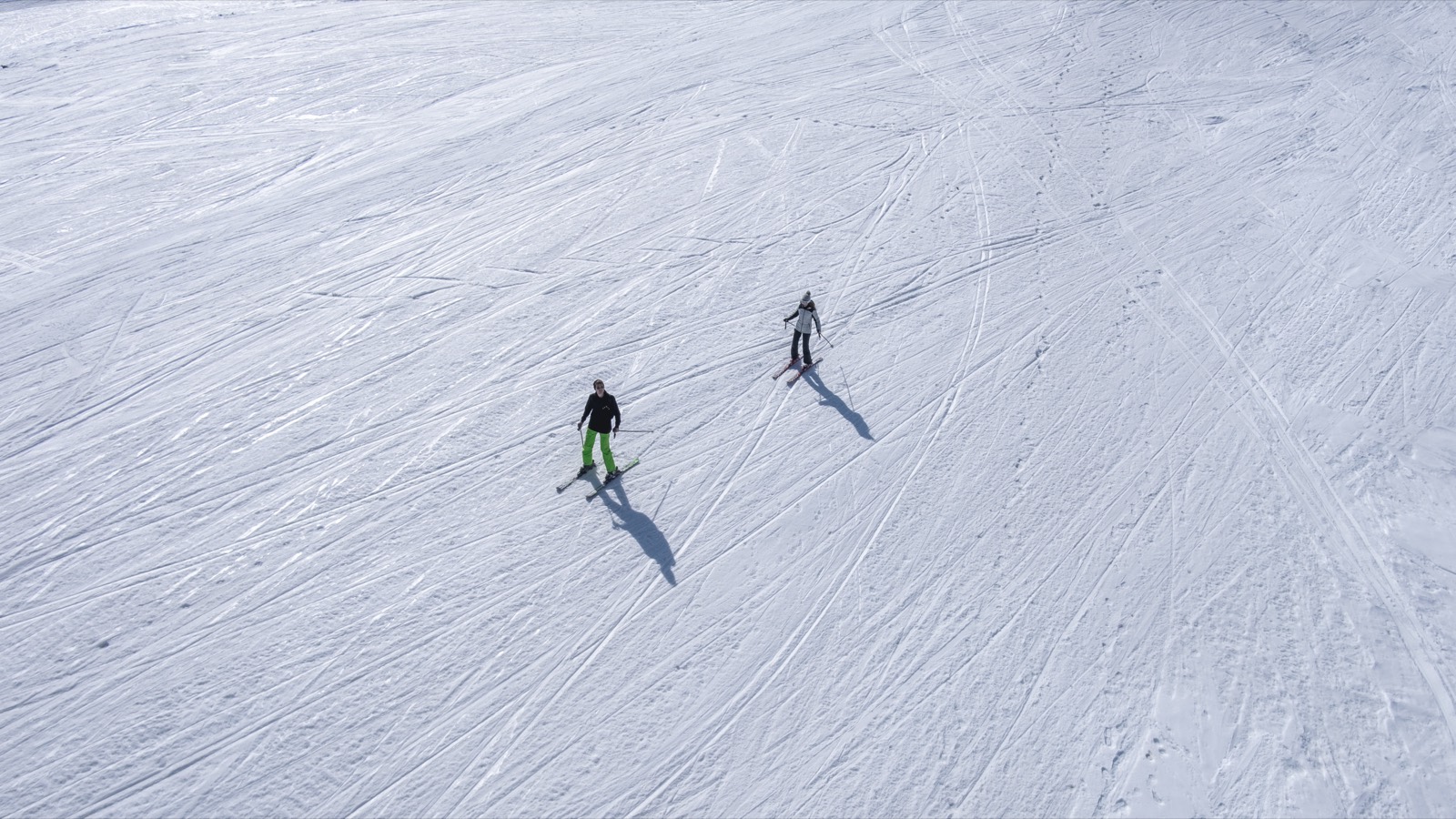 Two skiers seen from above